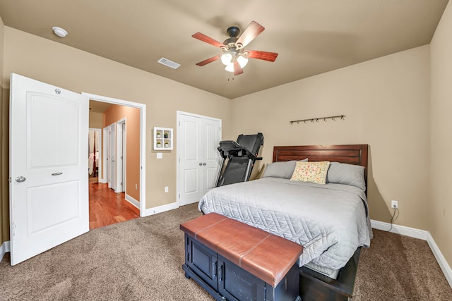 carpeted bedroom with ceiling fan