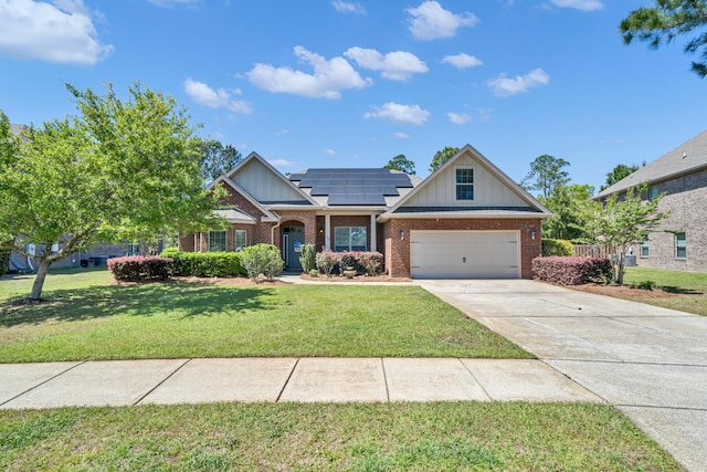 craftsman-style house with a garage, solar panels, and a front yard