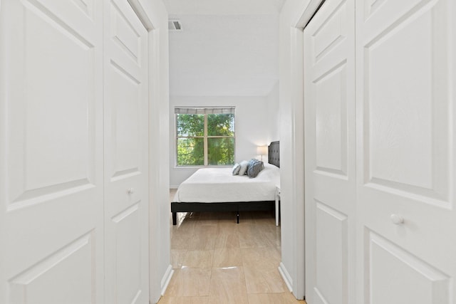 corridor featuring light hardwood / wood-style flooring