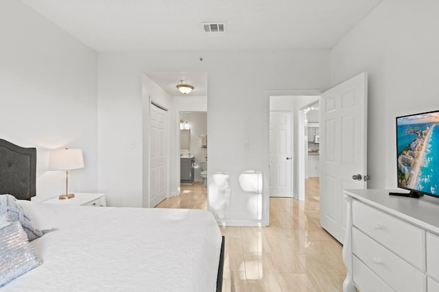 bedroom featuring light hardwood / wood-style floors