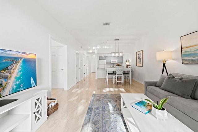 living room featuring light hardwood / wood-style flooring