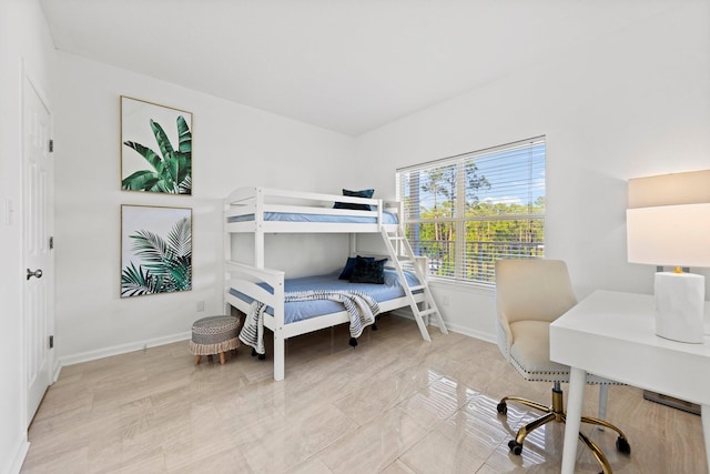 bedroom featuring light tile floors