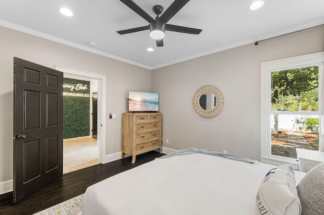 tiled bedroom with ceiling fan and crown molding