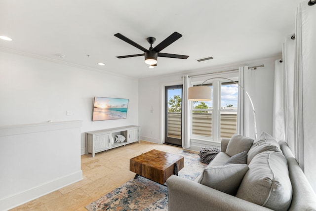 tiled living room with ornamental molding and ceiling fan