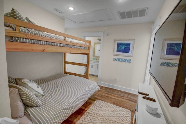 bedroom with light wood-type flooring