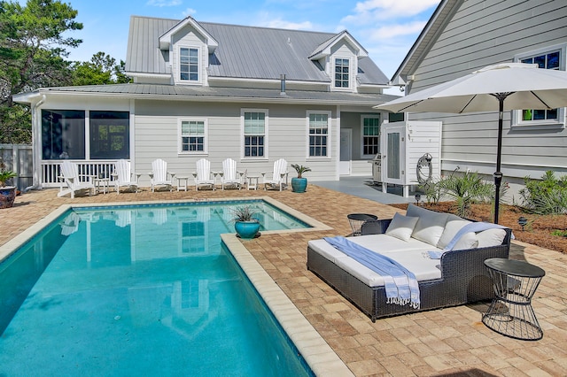 rear view of property featuring a patio