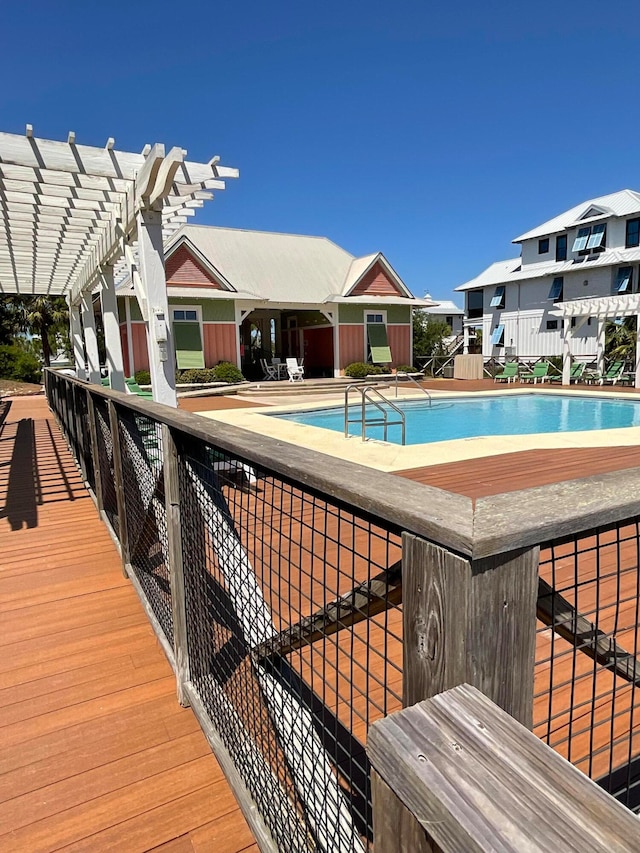 view of swimming pool featuring a pergola