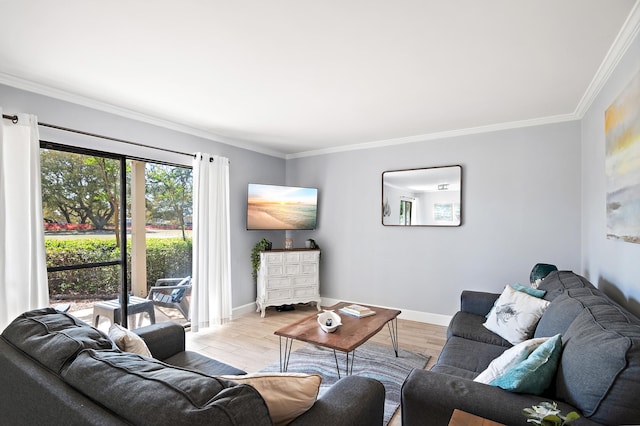 living room with ornamental molding and light hardwood / wood-style flooring