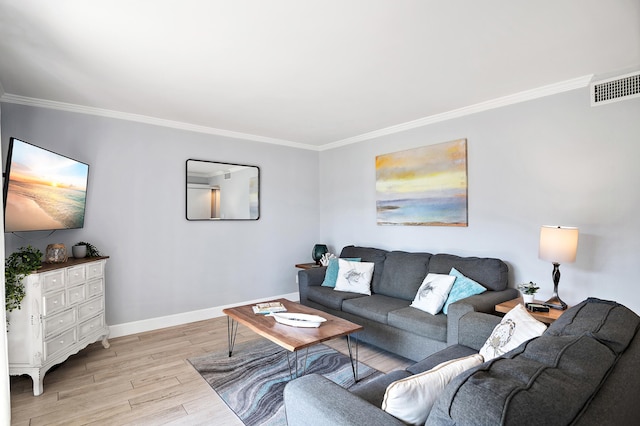 living room featuring crown molding and light wood-type flooring