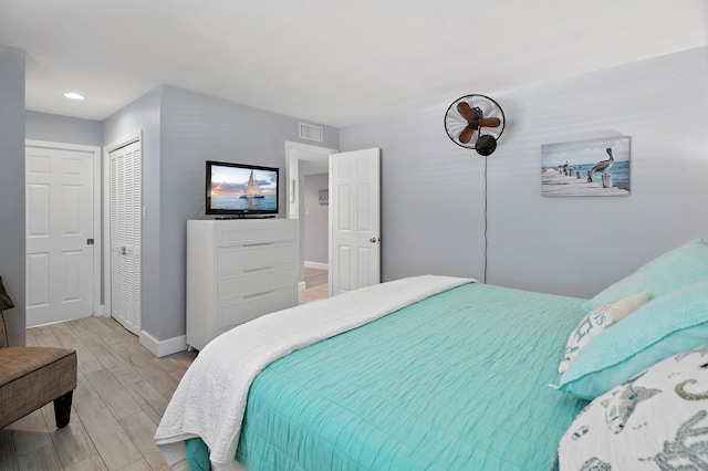 bedroom featuring light wood-type flooring