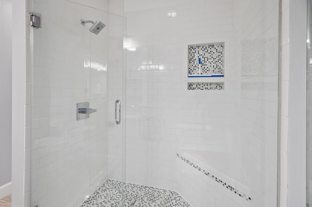 bathroom featuring walk in shower