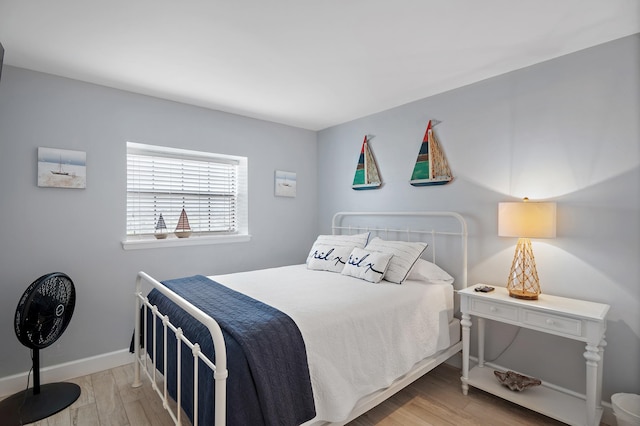 bedroom with light wood-type flooring