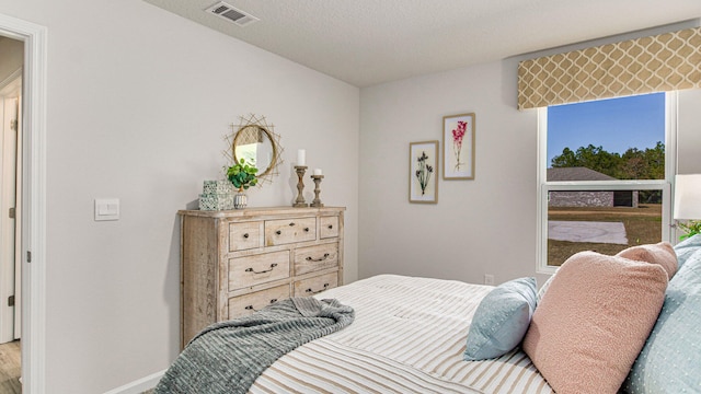 bedroom with a textured ceiling