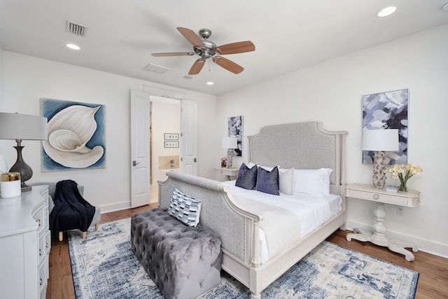 bedroom featuring wood-type flooring and ceiling fan