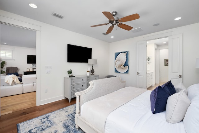 bedroom with hardwood / wood-style flooring and ceiling fan