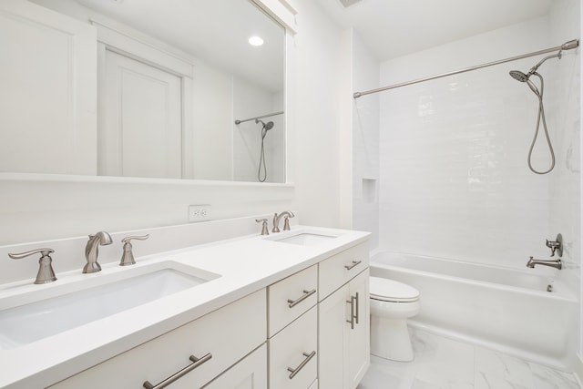 full bathroom with vanity, bathtub / shower combination, and toilet