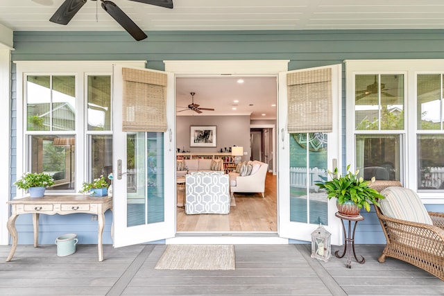 exterior space with ceiling fan