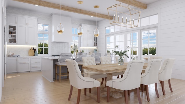 dining room with beamed ceiling, a notable chandelier, a healthy amount of sunlight, and light wood-type flooring