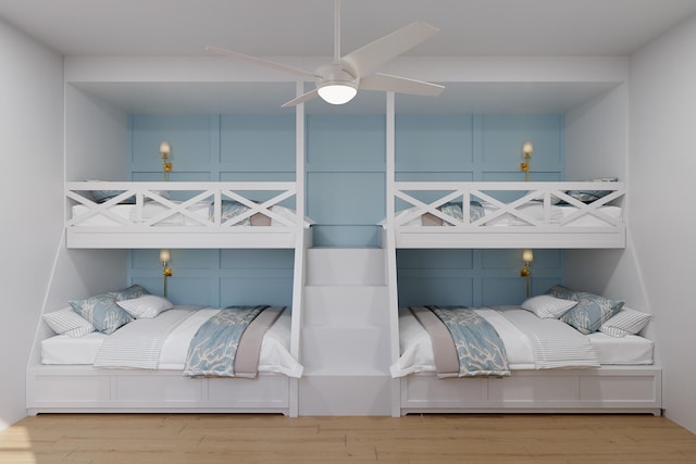 bedroom featuring light hardwood / wood-style flooring and ceiling fan