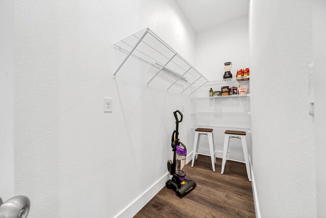 washroom with wood-type flooring