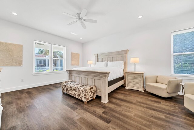 bedroom featuring ceiling fan and dark hardwood / wood-style floors