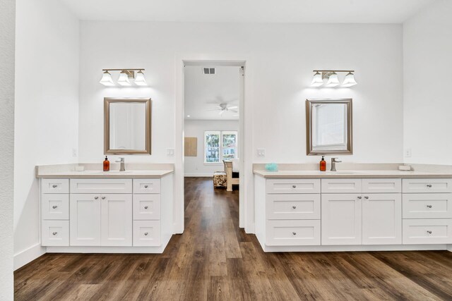 bathroom with vanity, ceiling fan, and wood-type flooring