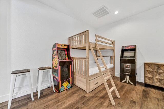 bedroom featuring dark hardwood / wood-style floors