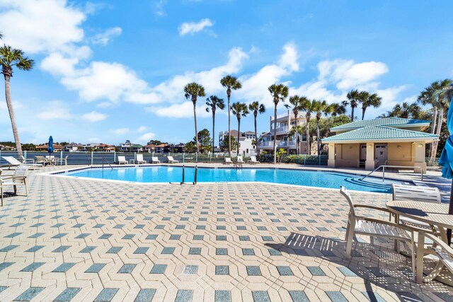 view of swimming pool featuring a patio