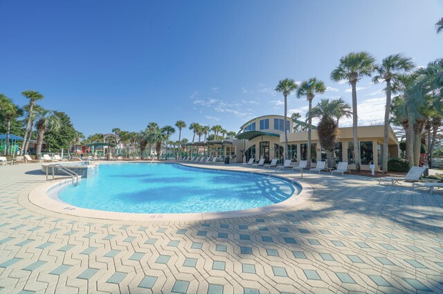 view of swimming pool featuring a patio