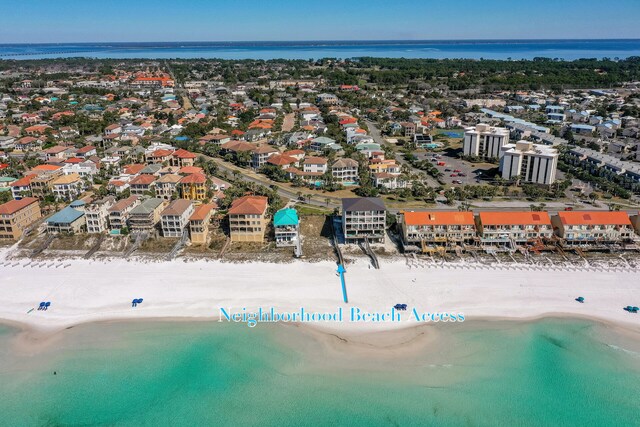 bird's eye view with a beach view and a water view