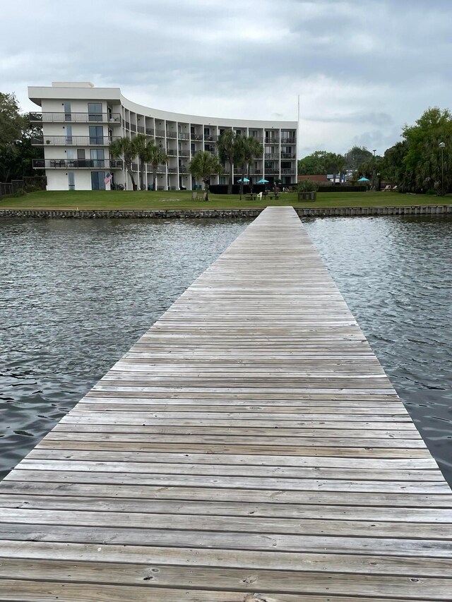 dock area with a water view