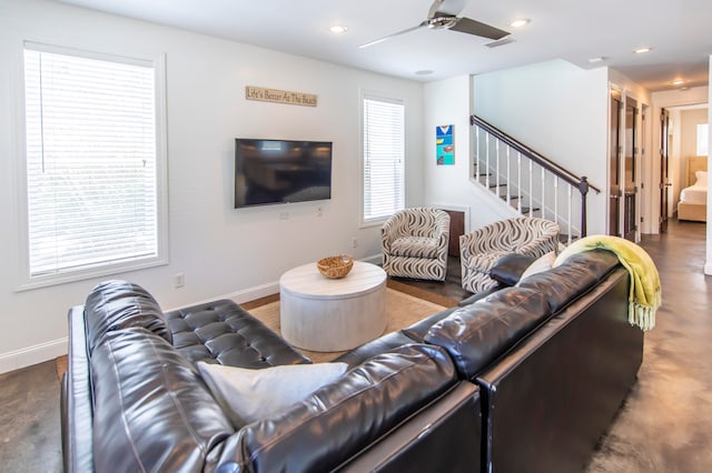 living room featuring ceiling fan