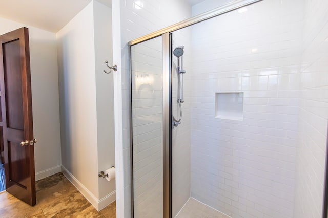 bathroom featuring walk in shower