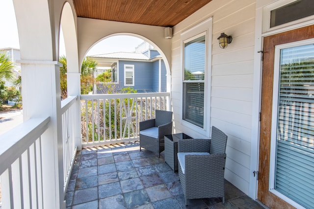 balcony featuring covered porch