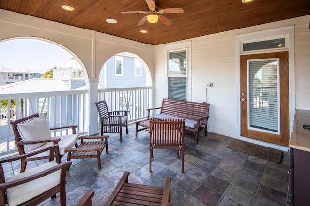 view of patio with ceiling fan and an outdoor hangout area