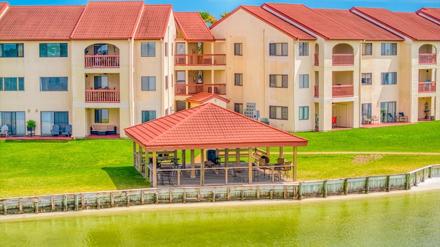 exterior space with a gazebo and a yard