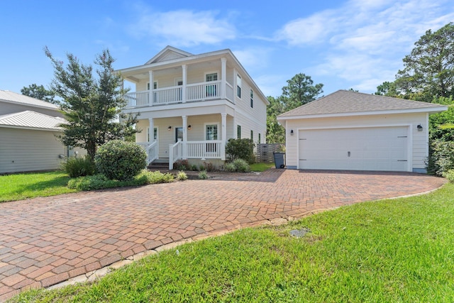 view of front of house featuring a balcony and a porch