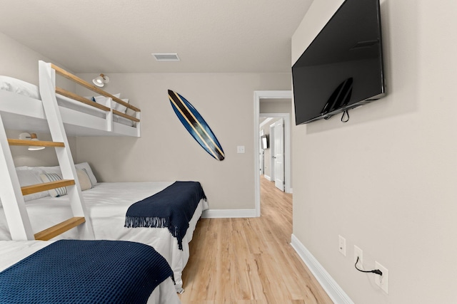 bedroom featuring light hardwood / wood-style flooring