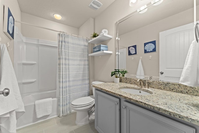 full bathroom featuring shower / bath combo with shower curtain, toilet, tile flooring, and vanity