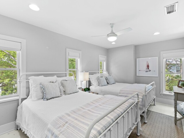 bedroom with baseboards, ceiling fan, visible vents, and recessed lighting