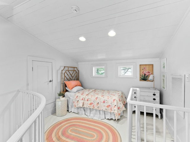 bedroom featuring vaulted ceiling