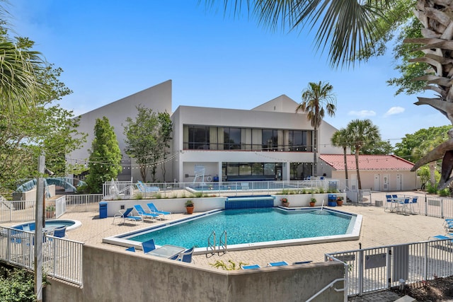 view of pool featuring a patio