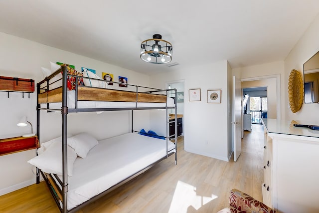 bedroom featuring light hardwood / wood-style floors