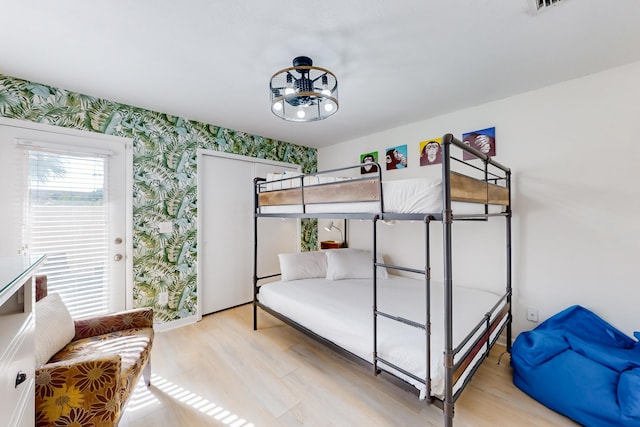 bedroom with light hardwood / wood-style flooring