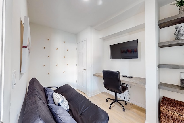 office space with light wood-type flooring