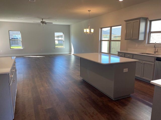 kitchen with a center island, sink, and a wealth of natural light