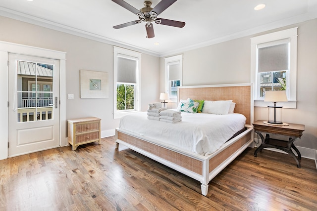 bedroom featuring ornamental molding, wood-type flooring, ceiling fan, and access to exterior