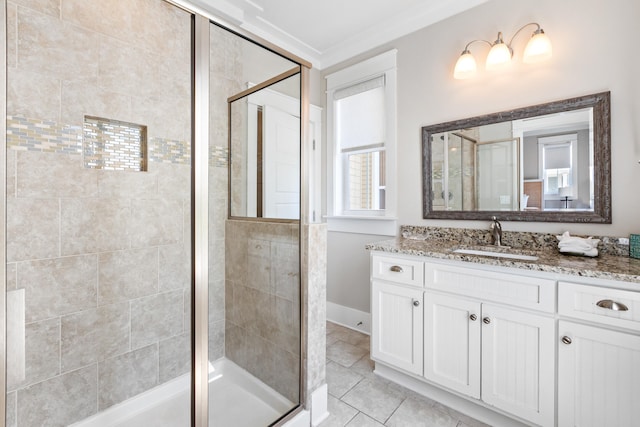 bathroom featuring a shower with door, ornamental molding, vanity, and tile flooring