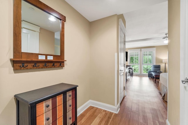 corridor featuring hardwood / wood-style flooring