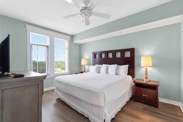 bedroom featuring wood-type flooring and ceiling fan